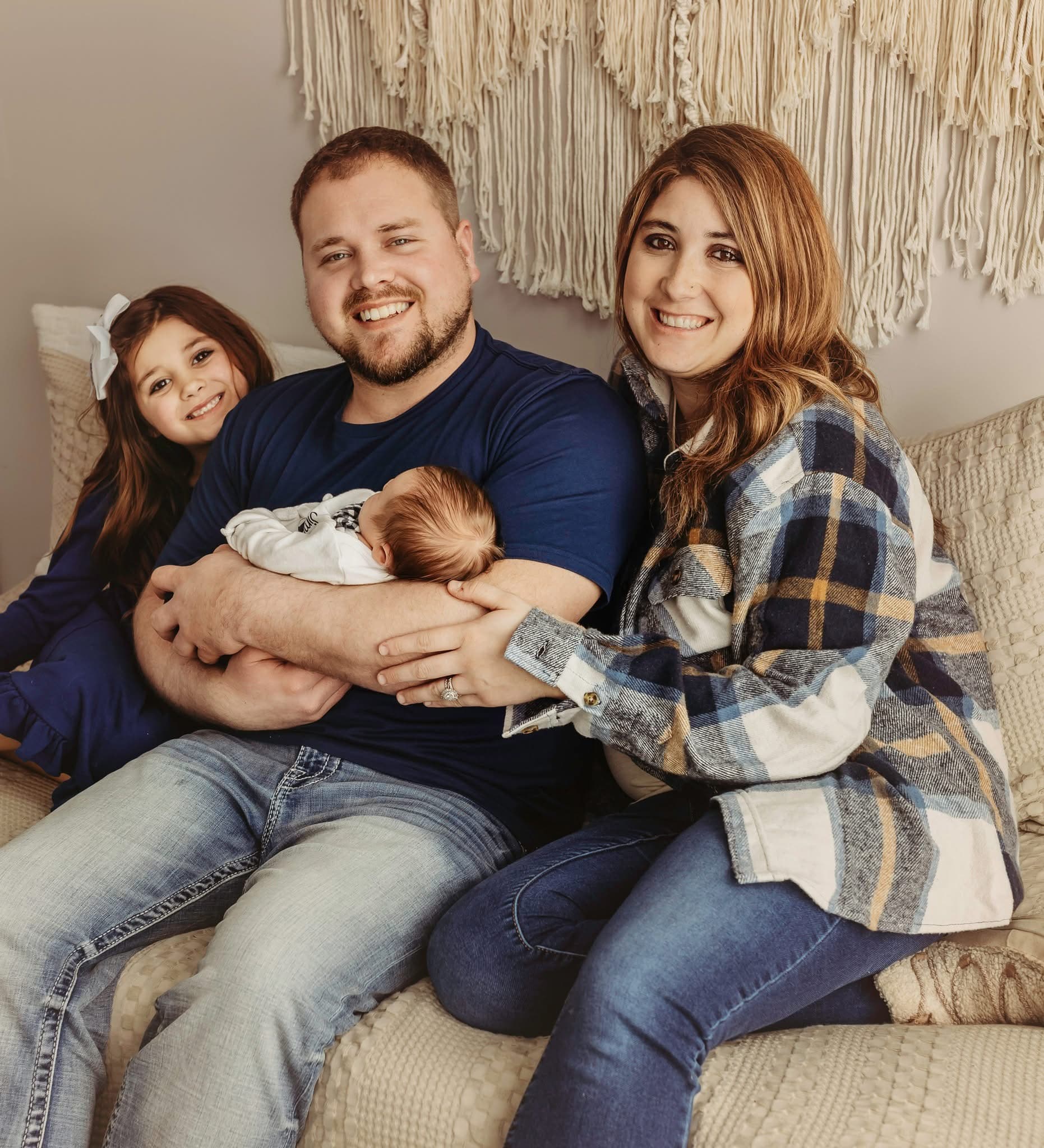 James Glass with his wife and children, owner of Lower MI Pools