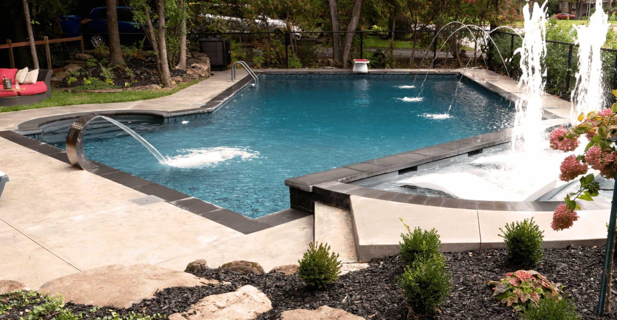 Latham vinyl liner in-ground pool installation behind the homepage call to action